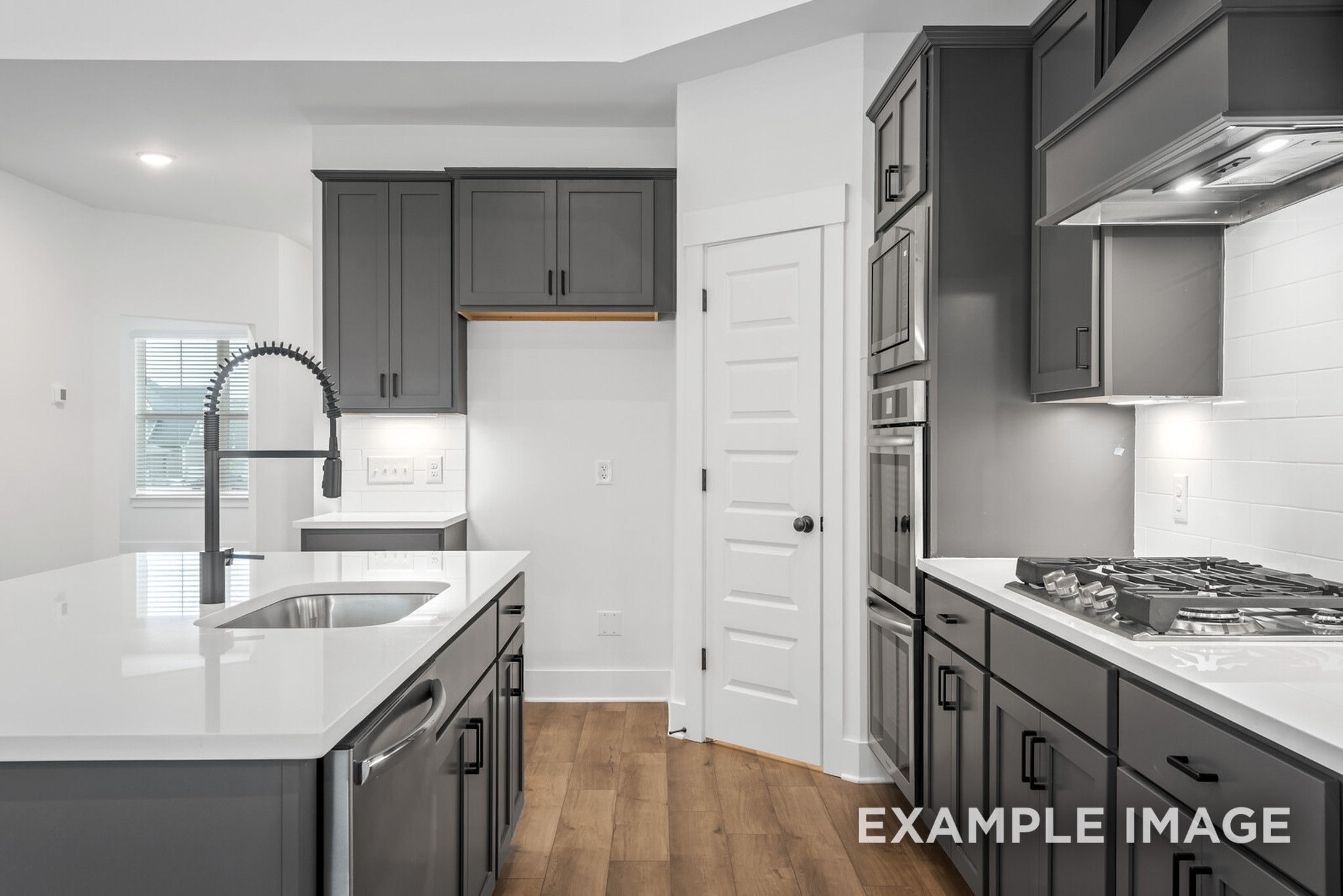105 Rock Chimney Road Gallatin, TN 37066 - Photo 58 of 93 a kitchen with stainless steel appliances granite countertop a sink stove and refrigerator