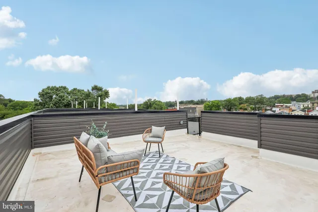 a view of a chairs and table on the terrace