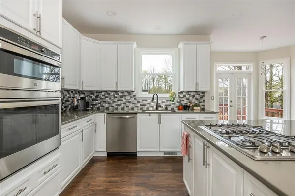 a bathroom with a shower and a bathtub