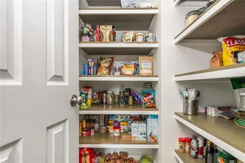 a view of staircase with rug floor