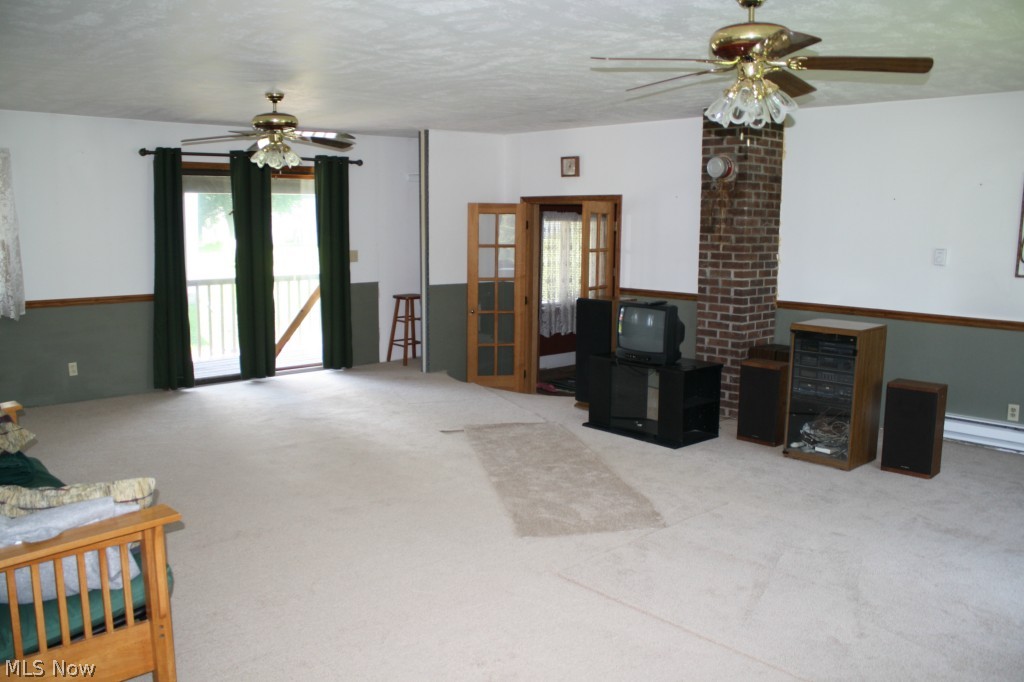 6015 Millbrook Road Shreve, OH 44676 - Photo 8 of 21 two ceiling fans and lots of light!!