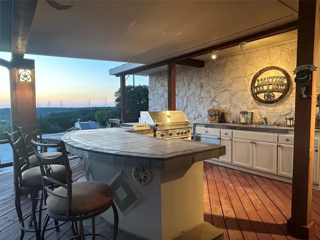 a view of a lake with houses in the back