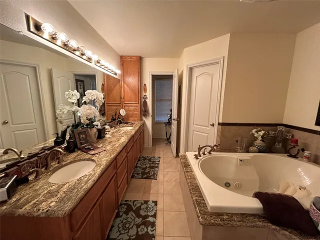 a view of a park with swings and a table