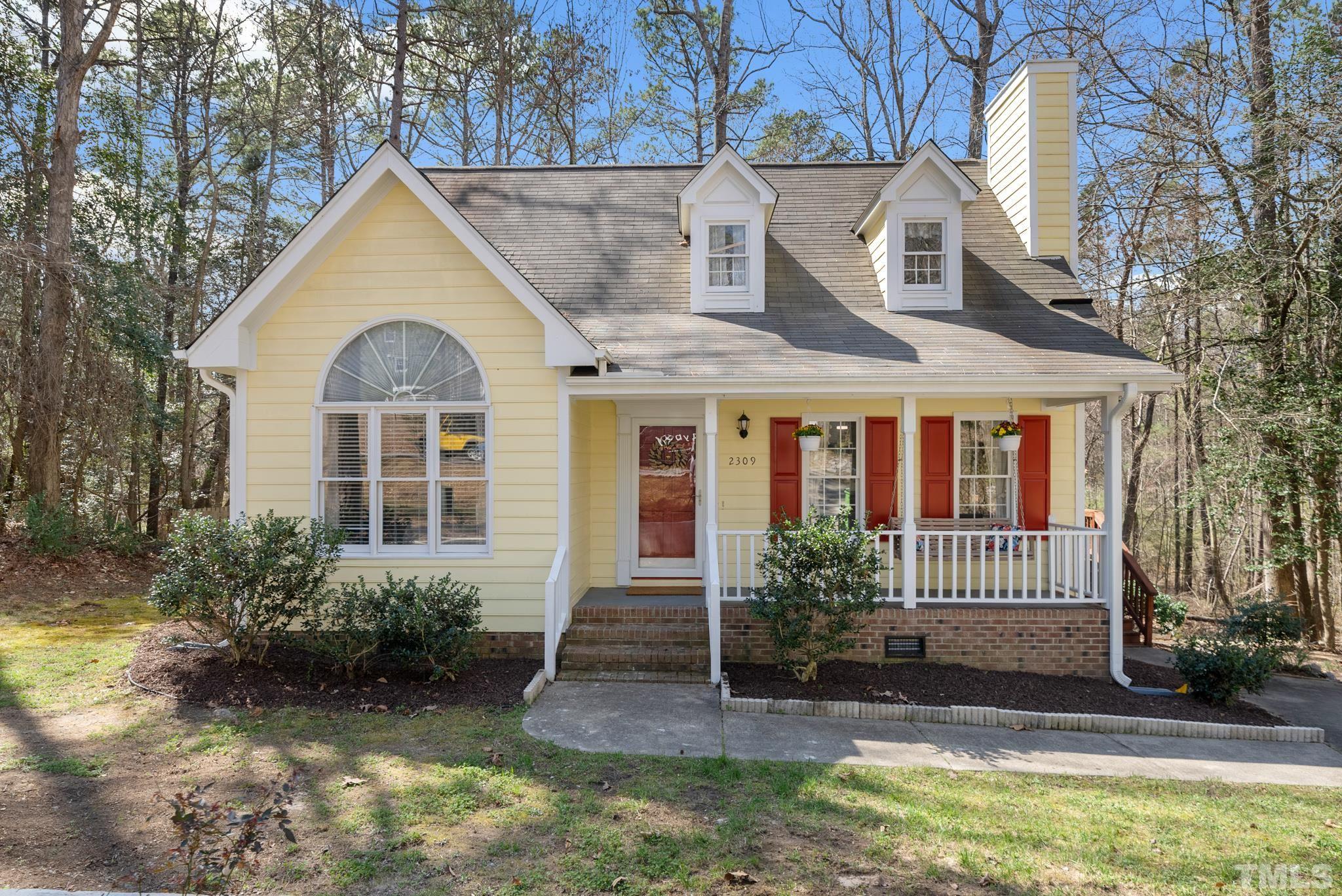2309 Ruddy Road Raleigh, NC 27616 - Photo 1 of 16 a front view of a house with a yard
