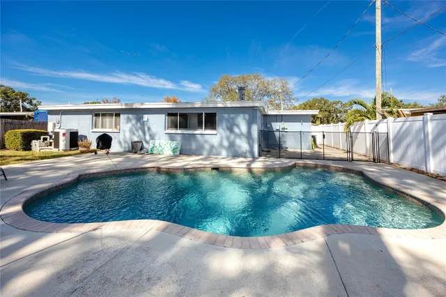 a view of a house with a yard balcony