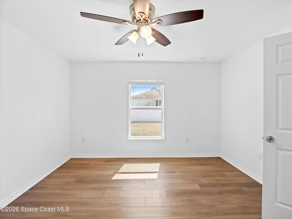 a bathroom with a sink vanity and a mirror