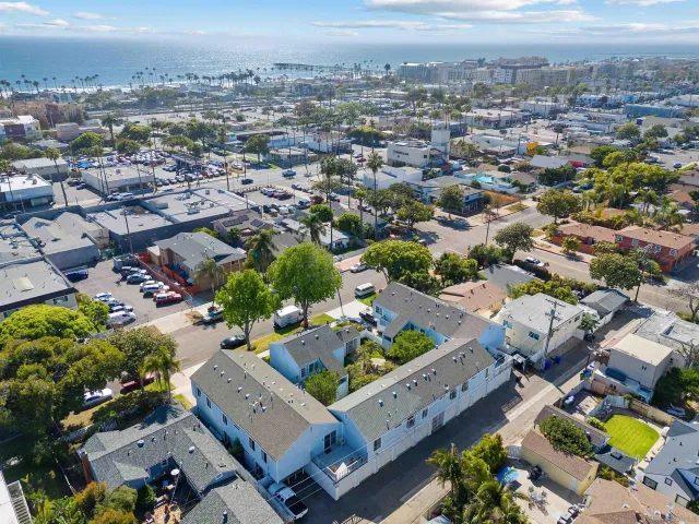 an aerial view of a city with lots of residential buildings