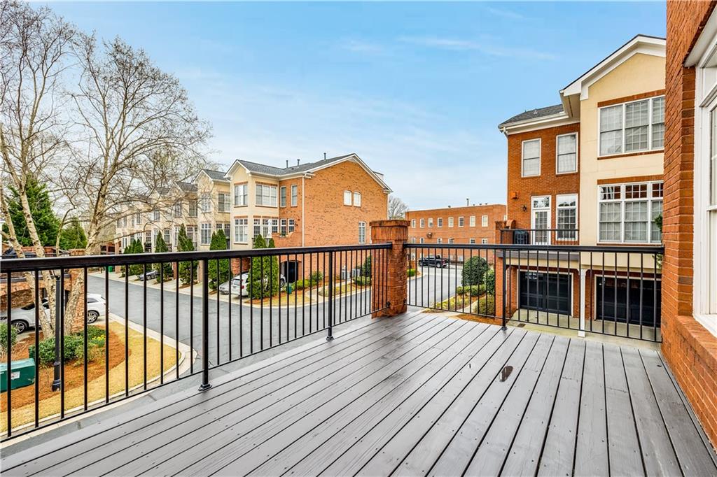 2586 Brookhaven Chase Lane Northeast Atlanta, GA 30319 - Photo 18 of 51 a view of a house with a deck