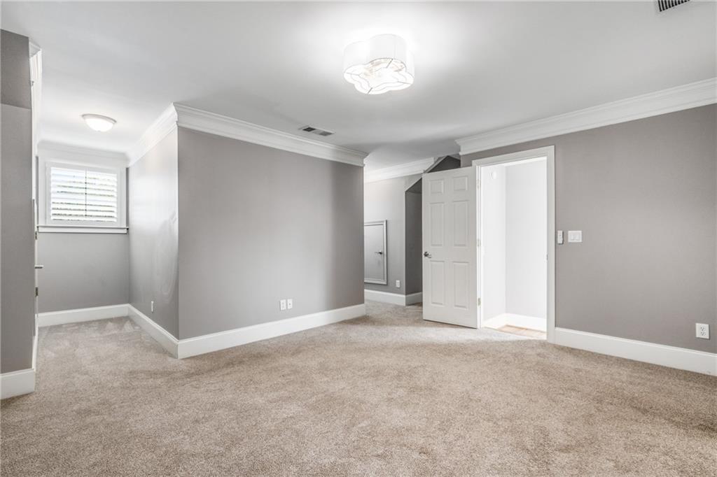 2586 Brookhaven Chase Lane Northeast Atlanta, GA 30319 - Photo 26 of 51 a view of an empty room with a window