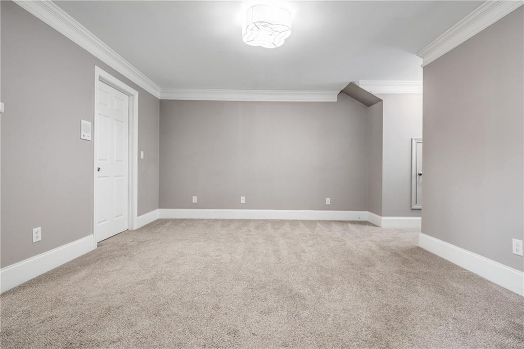 2586 Brookhaven Chase Lane Northeast Atlanta, GA 30319 - Photo 27 of 51 a view of an empty room and a window