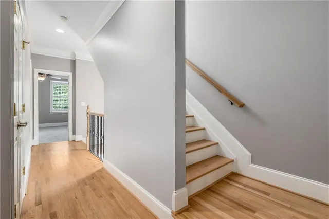 a white bath tub sitting next to a bathroom