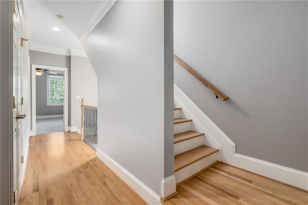 2586 Brookhaven Chase Lane Northeast Atlanta, GA 30319 - Photo 28 of 51 a view of a hallway with wooden floor and entryway