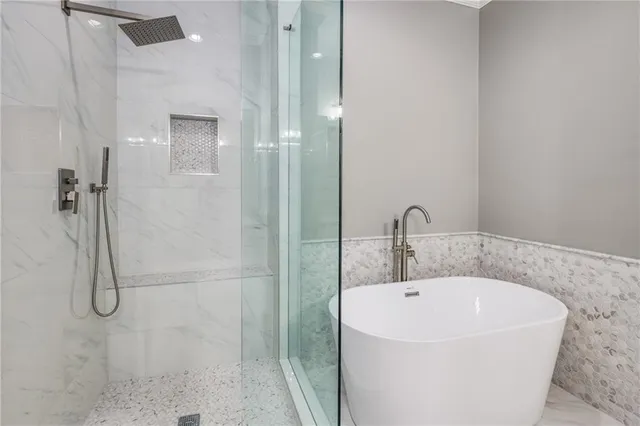 a bathroom with a sink vanity granite and a mirror