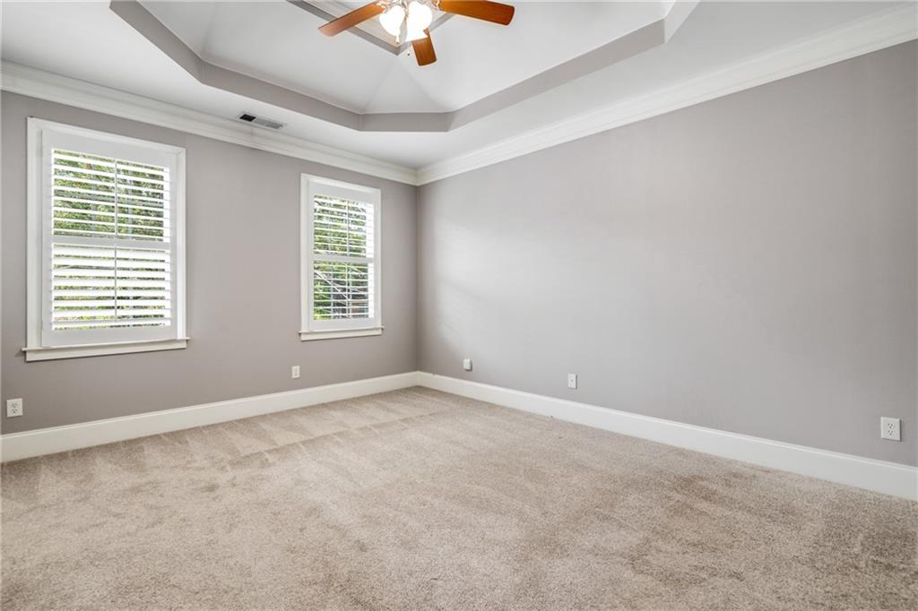 2586 Brookhaven Chase Lane Northeast Atlanta, GA 30319 - Photo 33 of 51 a view of an empty room with windows