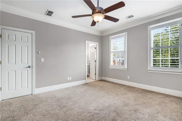 a view of a hallway with entryway wooden floor and front door