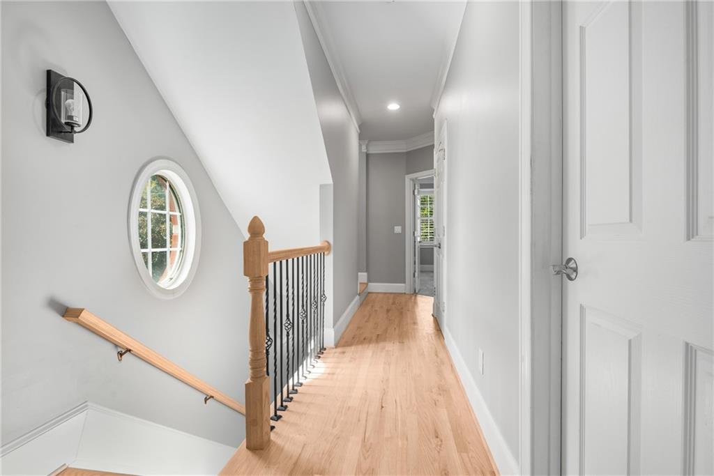 2586 Brookhaven Chase Lane Northeast Atlanta, GA 30319 - Photo 37 of 51 a view of a hallway with entryway wooden floor and front door