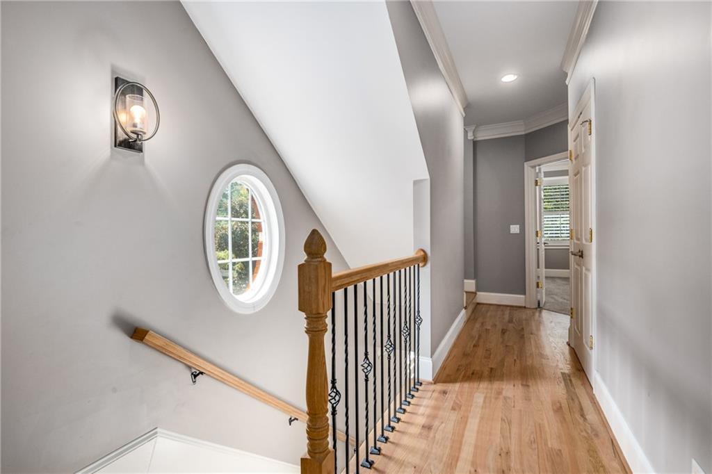 2586 Brookhaven Chase Lane Northeast Atlanta, GA 30319 - Photo 38 of 51 a view of a hallway with entryway wooden floor and front door