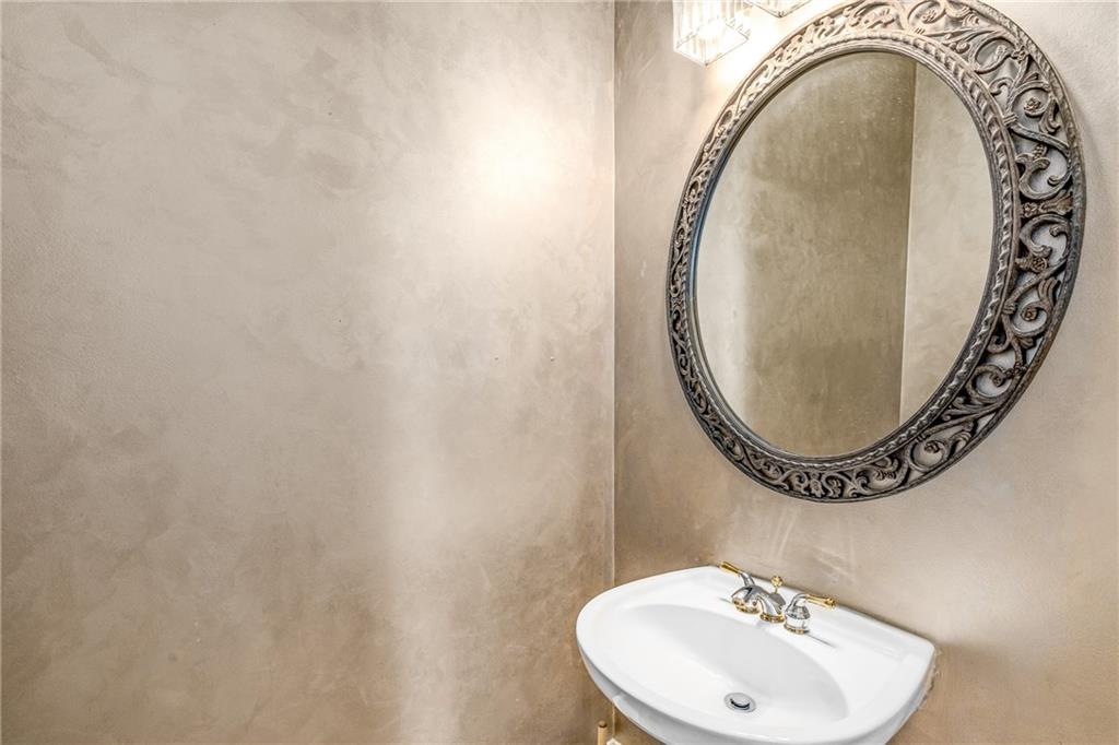 2586 Brookhaven Chase Lane Northeast Atlanta, GA 30319 - Photo 47 of 51 a bathroom with a sink and a mirror