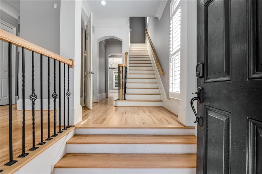2586 Brookhaven Chase Lane Northeast Atlanta, GA 30319 - Photo 51 of 51 a view of staircase with wooden floor and a window