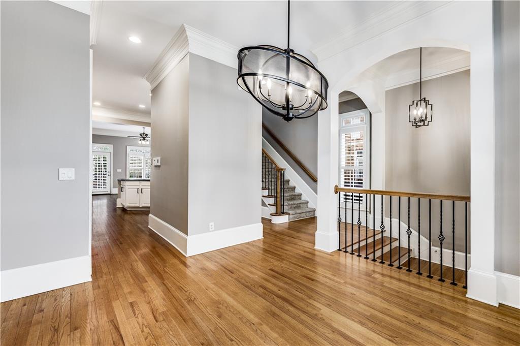 2586 Brookhaven Chase Lane Northeast Atlanta, GA 30319 - Photo 6 of 51 a view of a hallway with wooden floor