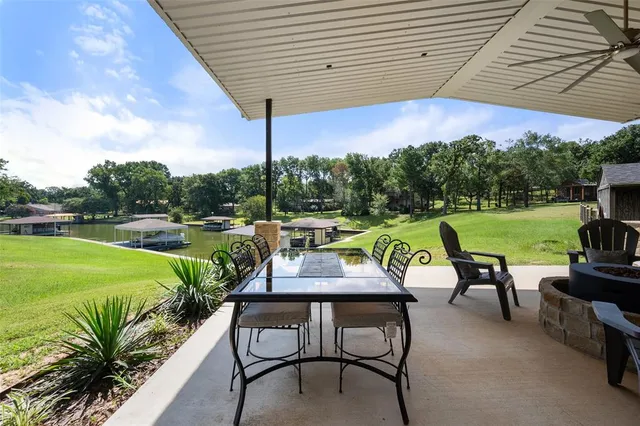 a view of a swimming pool with a patio