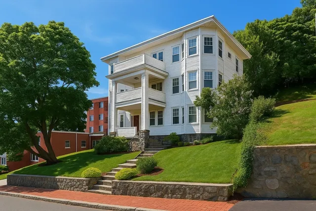 front view of house with a yard