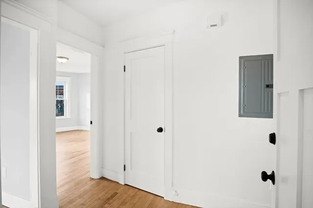 a view of a bathroom with wooden floor