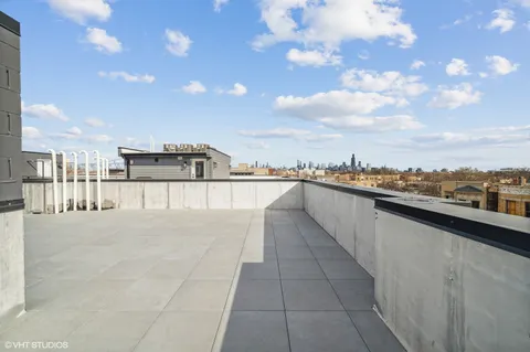 a view of a terrace with city view