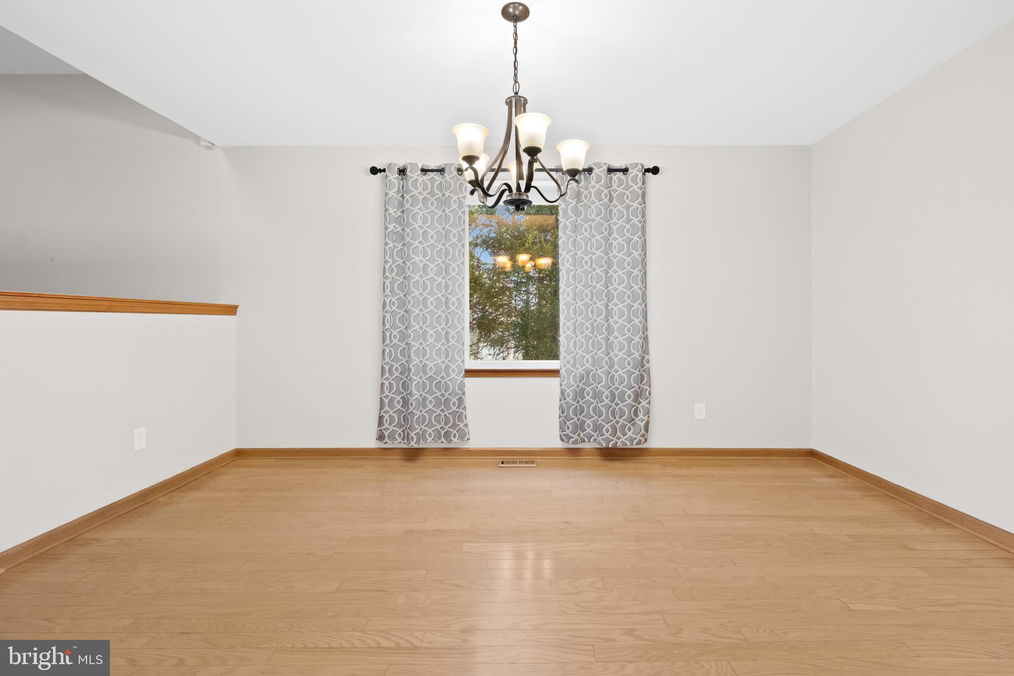 127 Heath Road Medford, NJ 08055 - Photo 12 of 63 a view of a windows and chandelier in a room