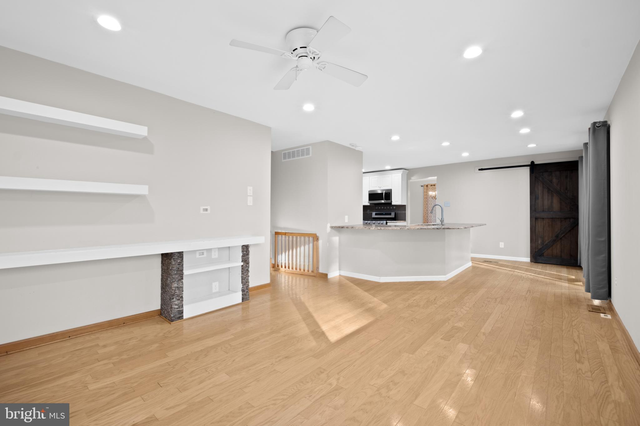 127 Heath Road Medford, NJ 08055 - Photo 20 of 63 a view of a kitchen with a sink and a refrigerator