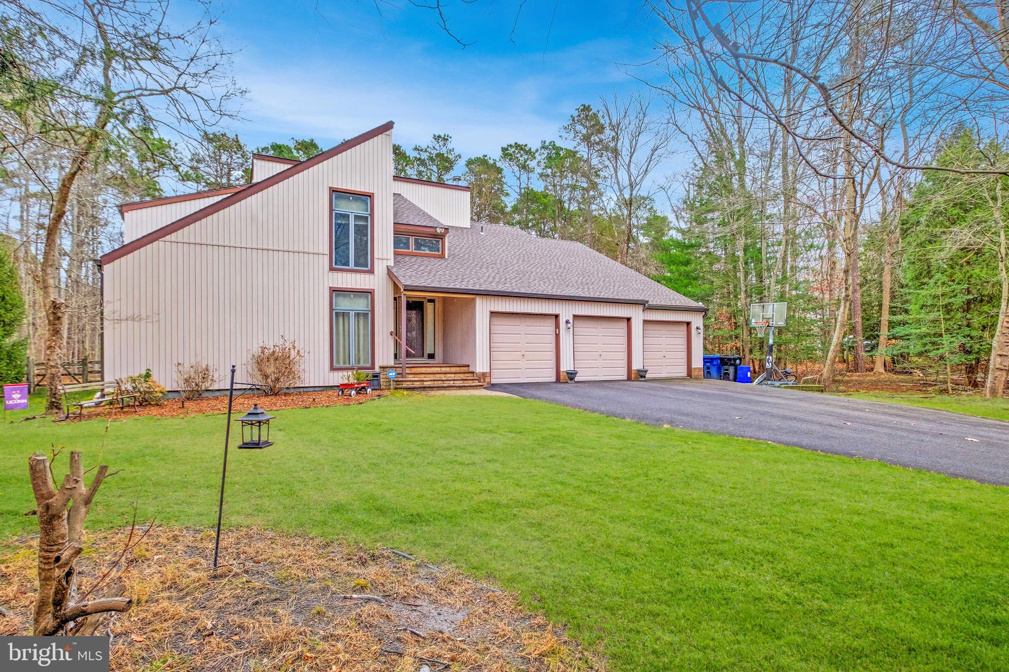 127 Heath Road Medford, NJ 08055 - Photo 2 of 63 a view of a house with a yard and sitting area