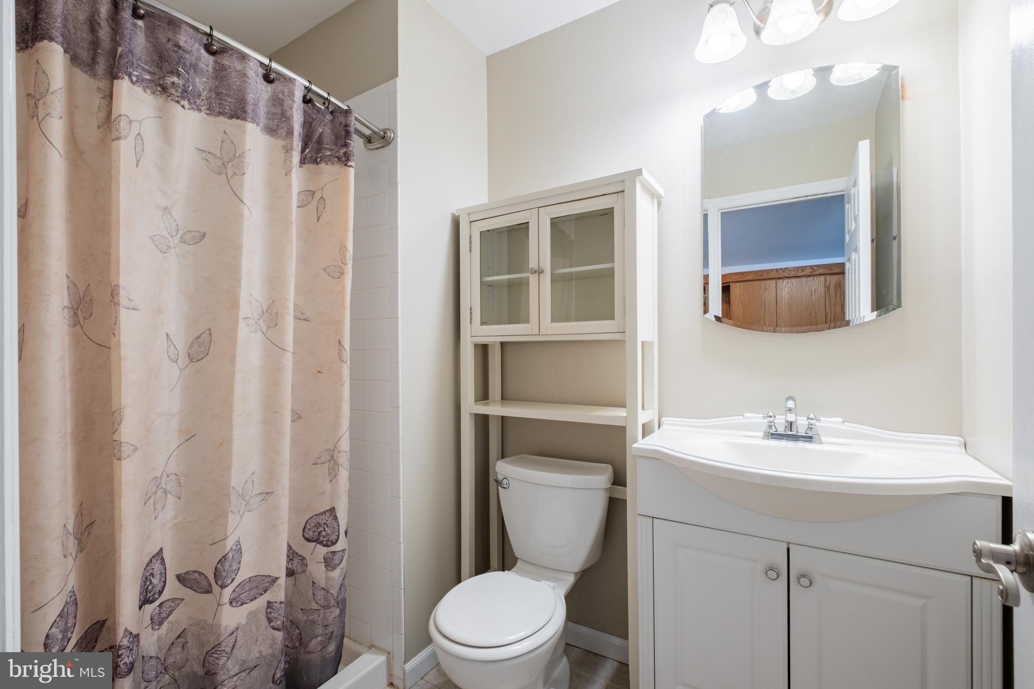 127 Heath Road Medford, NJ 08055 - Photo 35 of 63 a bathroom with a sink toilet and shower