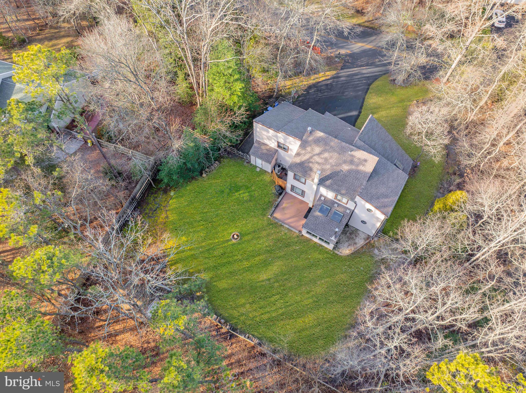 127 Heath Road Medford, NJ 08055 - Photo 4 of 63 a aerial view of a house with a yard and lake view