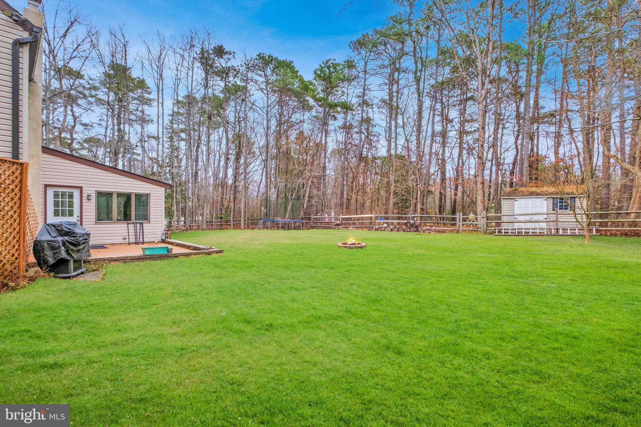 127 Heath Road Medford, NJ 08055 - Photo 47 of 63 a view of yard with swimming pool and green space