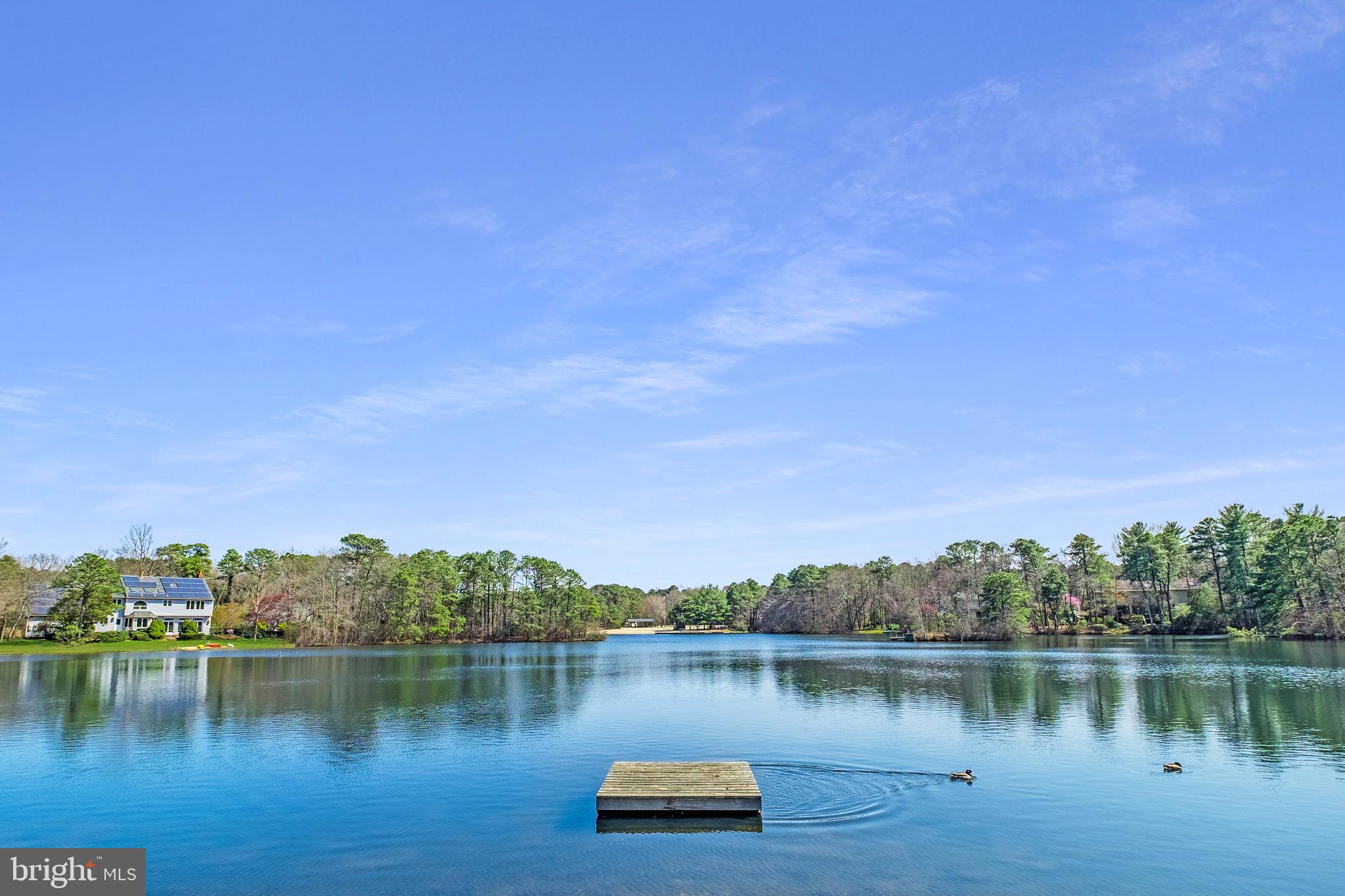 127 Heath Road Medford, NJ 08055 - Photo 62 of 63 a view of a lake with houses