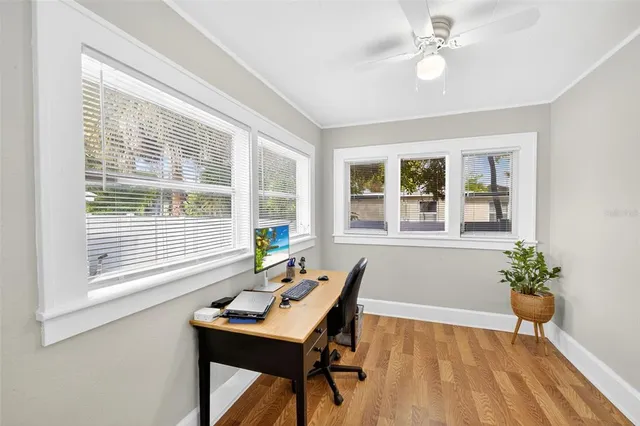 a workspace with furniture and a window