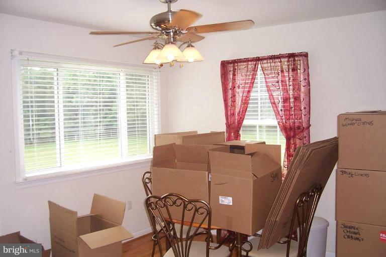 14011 Reva Road Boston, VA 22713 - Photo 14 of 18 a view of a dining room with furniture window and outside view