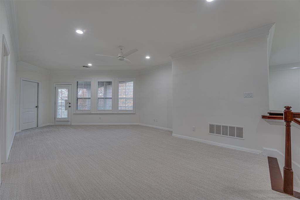 2216 Kings Pass Heath, TX 75032 - Photo 34 of 40 a view of empty room with window