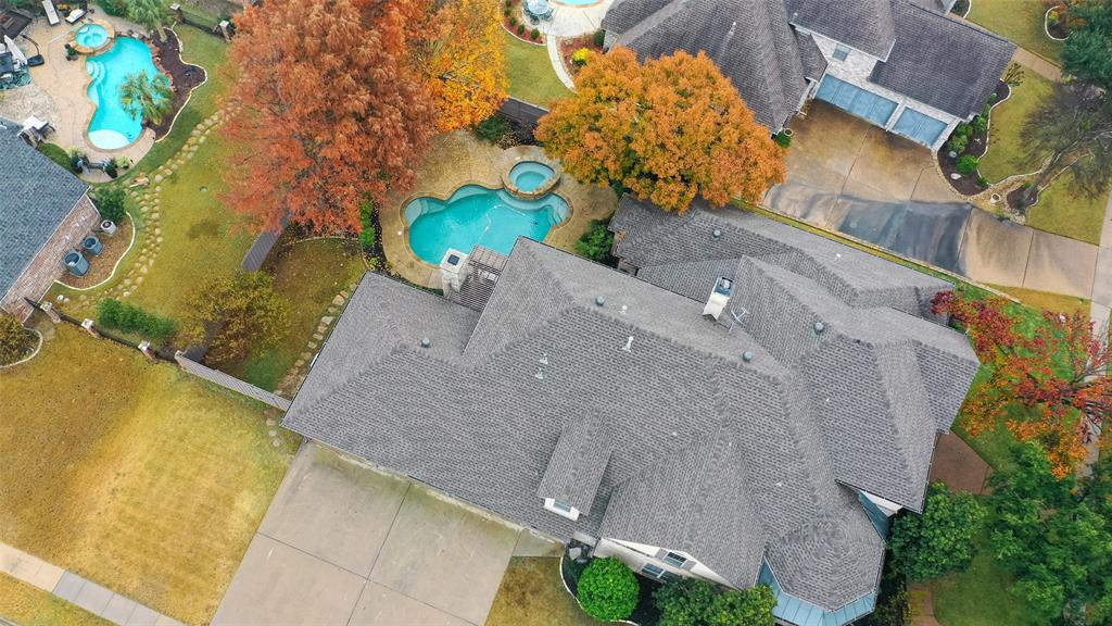2216 Kings Pass Heath, TX 75032 - Photo 40 of 40 an aerial view of a house with a yard and lake view