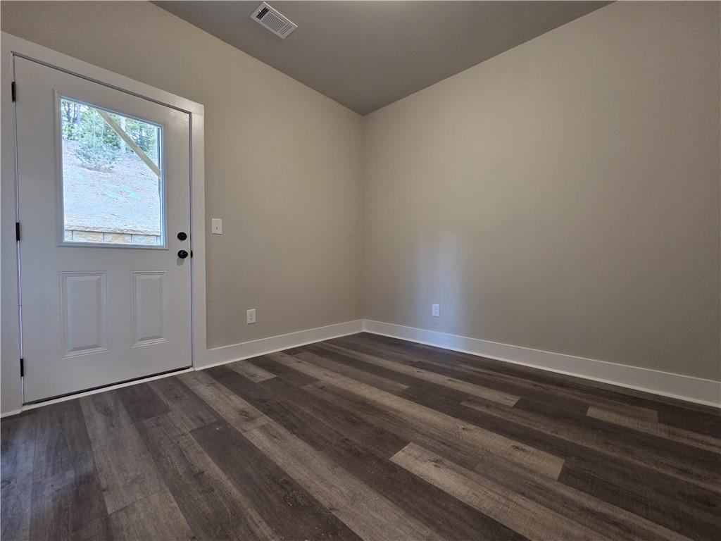 2 Rock Pk Way, Unit 13 Tucker, GA 30084 - Photo 11 of 39 wooden floor in an empty room