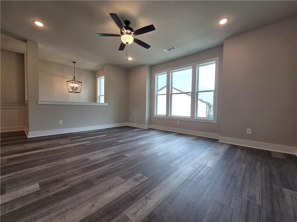 2 Rock Pk Way, Unit 13 Tucker, GA 30084 - Photo 22 of 39 a view of an empty room with a window and wooden floor