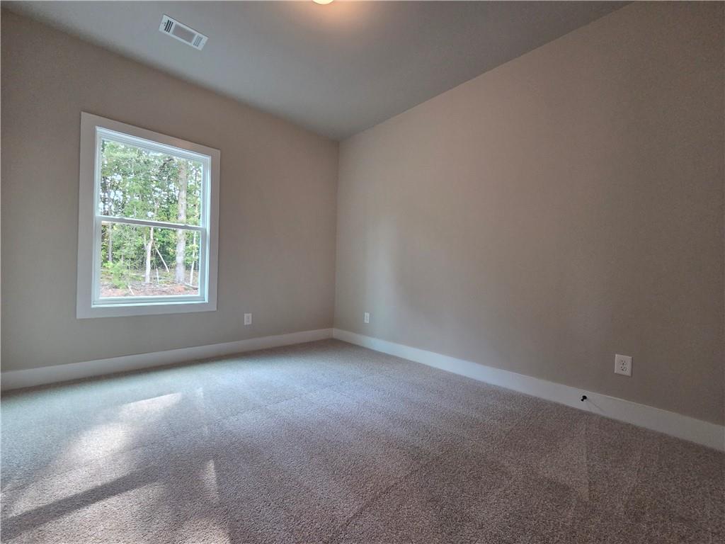 2 Rock Pk Way, Unit 13 Tucker, GA 30084 - Photo 26 of 39 an empty room with a window