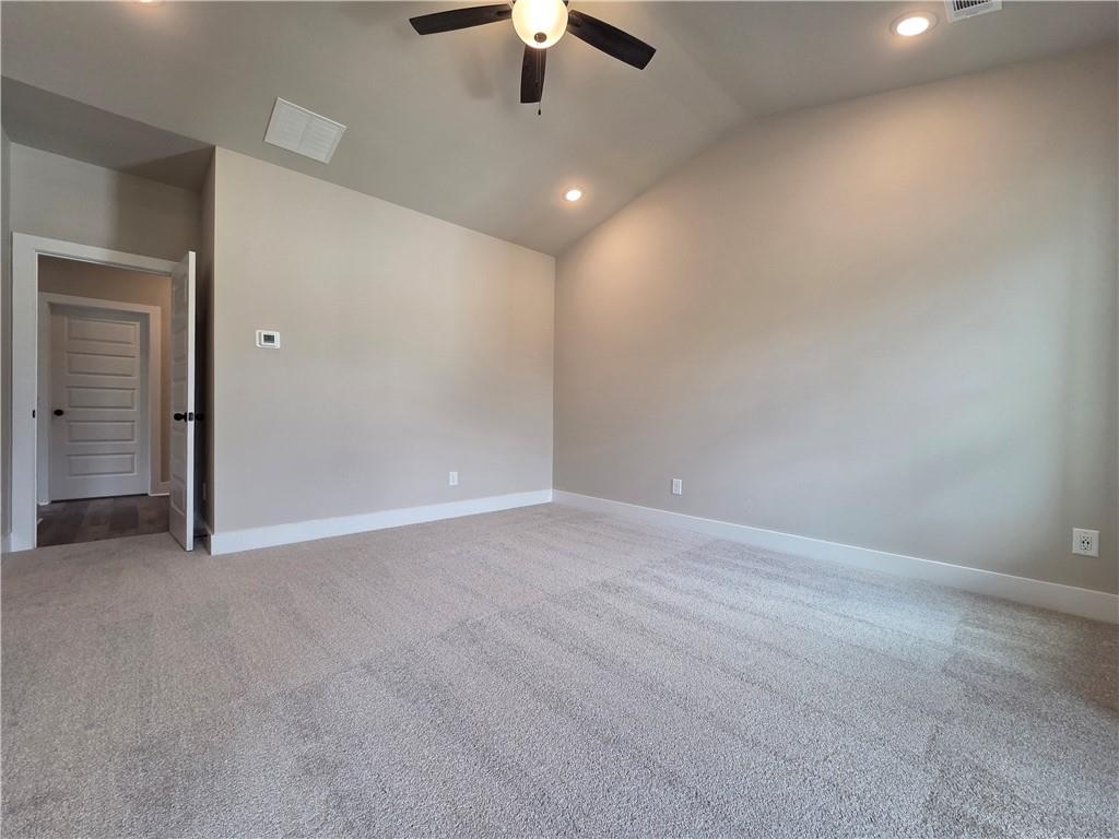 2 Rock Pk Way, Unit 13 Tucker, GA 30084 - Photo 31 of 39 an empty room with chandelier fan and window