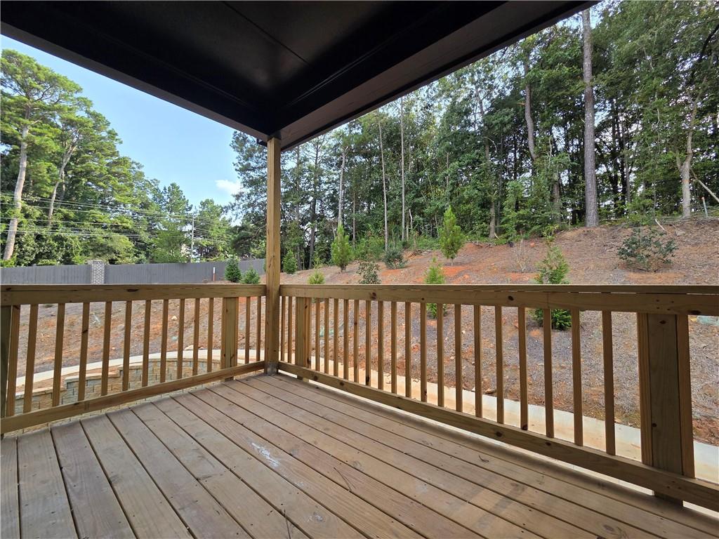 2 Rock Pk Way, Unit 13 Tucker, GA 30084 - Photo 38 of 39 a balcony with wooden floor in outdoor space
