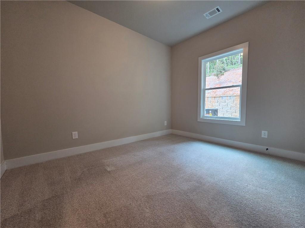 2 Rock Pk Way, Unit 13 Tucker, GA 30084 - Photo 10 of 39 an empty room with a window