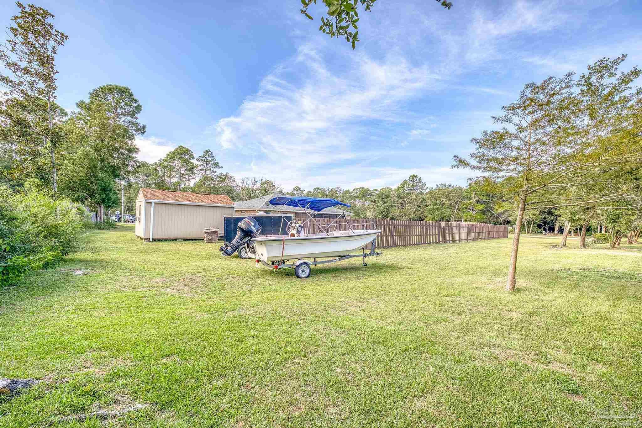 6474 Hammock Trace Milton, FL 32583 - Photo 38 of 50 More yard behind back fence