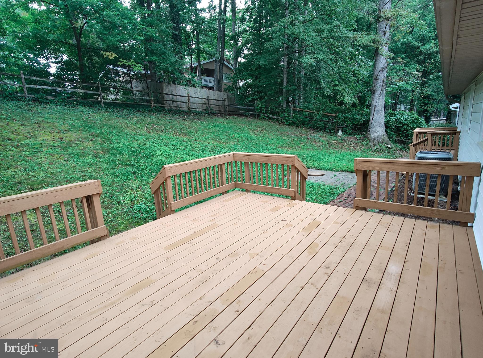 15712 Brandywine Road Dumfries, VA 22025 - Photo 10 of 15 a view of backyard with deck and garden
