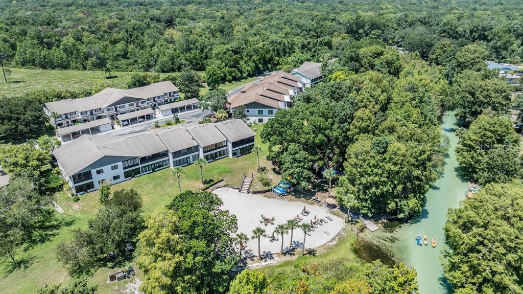 6630 River Run Boulevard, Unit 6630 Weeki Wachee, FL 34607 - Photo 1 of 1 an aerial view of a house with a yard