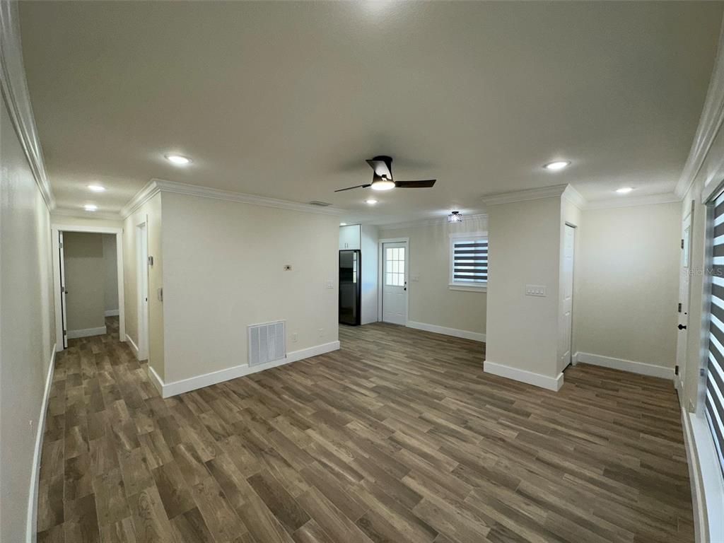 6013 Fortune Place, Unit 6013 Apollo Beach, FL 33572 - Photo 23 of 38 a view of an empty room and glass door