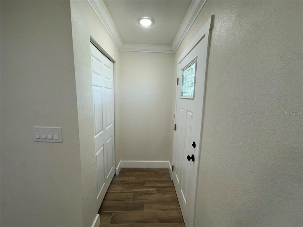 6013 Fortune Place, Unit 6013 Apollo Beach, FL 33572 - Photo 24 of 38 a view of a hallway
